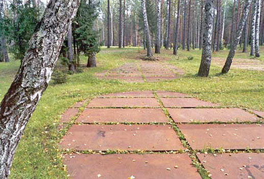 Countours of mass graves are covered with limestone tablets, symbolic gravestones; Source is http://en.wikipedia.org/wiki/Image:KatynPL-kontury.jpg